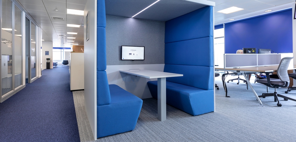 Creatif cube acoustic booth with blue panelling.